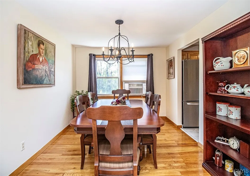 Formal dining room, kitchen to the right