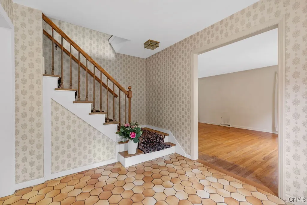 Beautiful foyer open to the formal living room