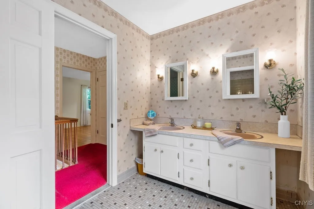 Second floor full bath with tub, shower and dual sinks