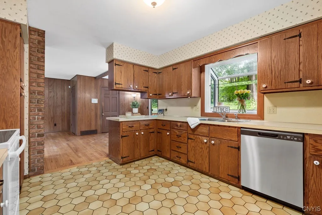 Large open kitchen with much counter space and cupboards for storage