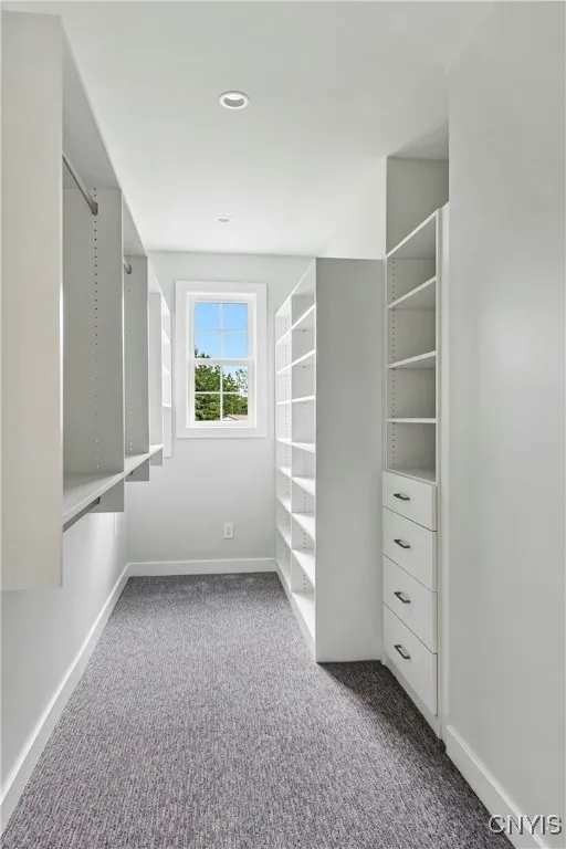 Primary suite walk-in closet.