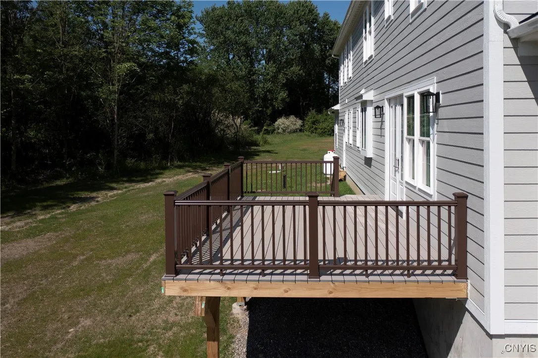 A spacious deck connected to the dining room through large double doors.