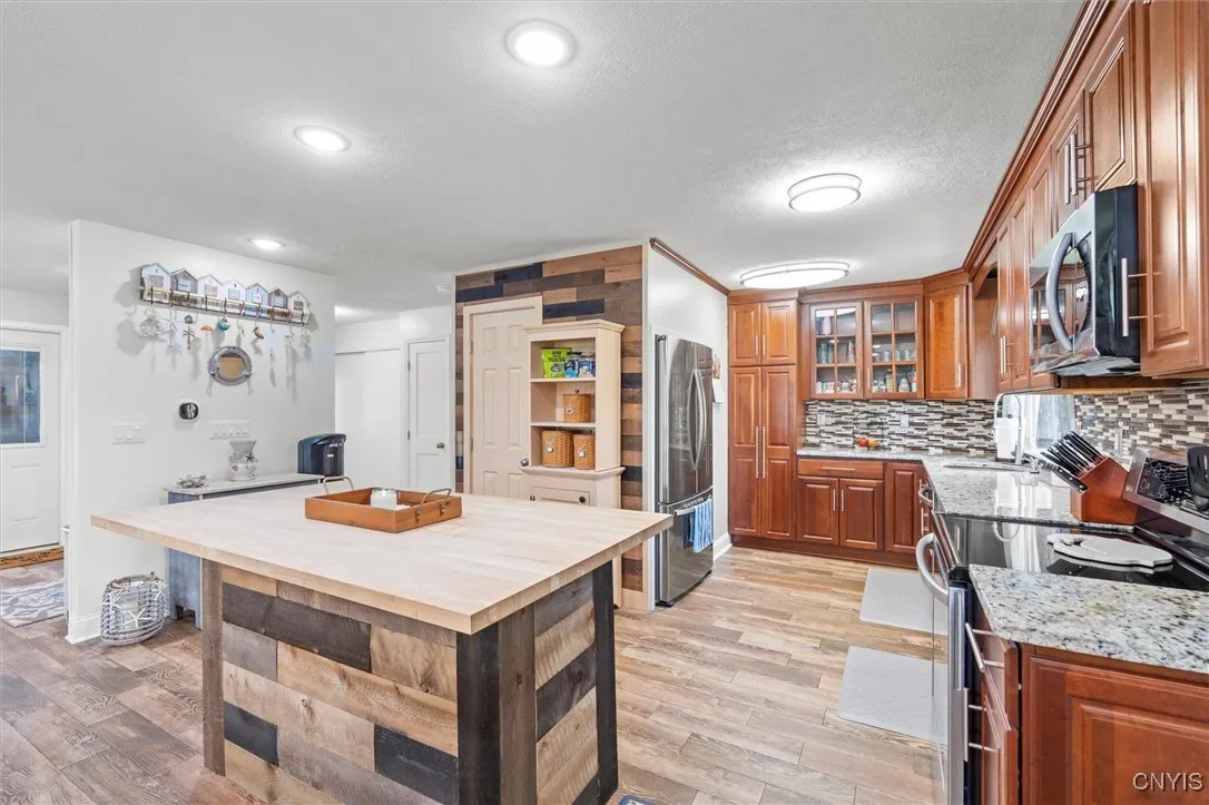 Kitchen w/ ample cabinets & pantry