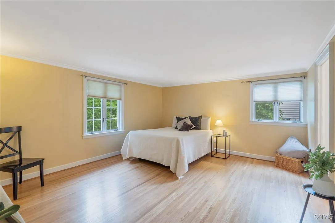 This massive room was just painted and offers plenty of wall & floor space for larger bedroom sets.