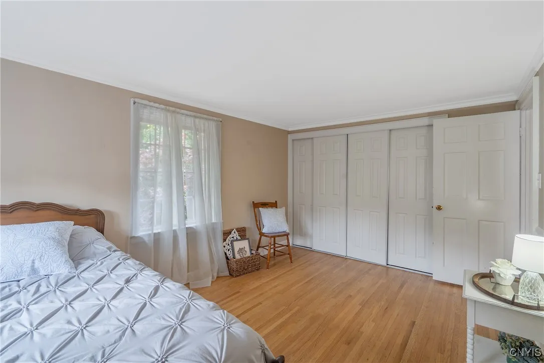 The closet across the entire far wall has a wonderful organizing system inside!