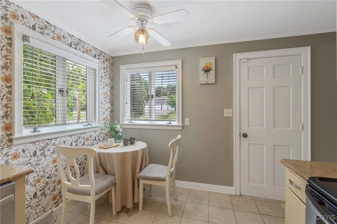 The corner works perfectly for an eat-in table - or you could create more counter and storage space with a breakfast bar unit with stools!