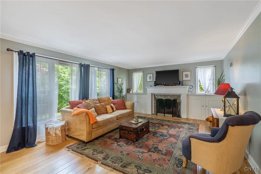 This wide, vast space offers versatility in how large seating furniture can be arranged. The large picture window with side windows that open on either side is all new as of 2017 (installed by Comfort Windows).