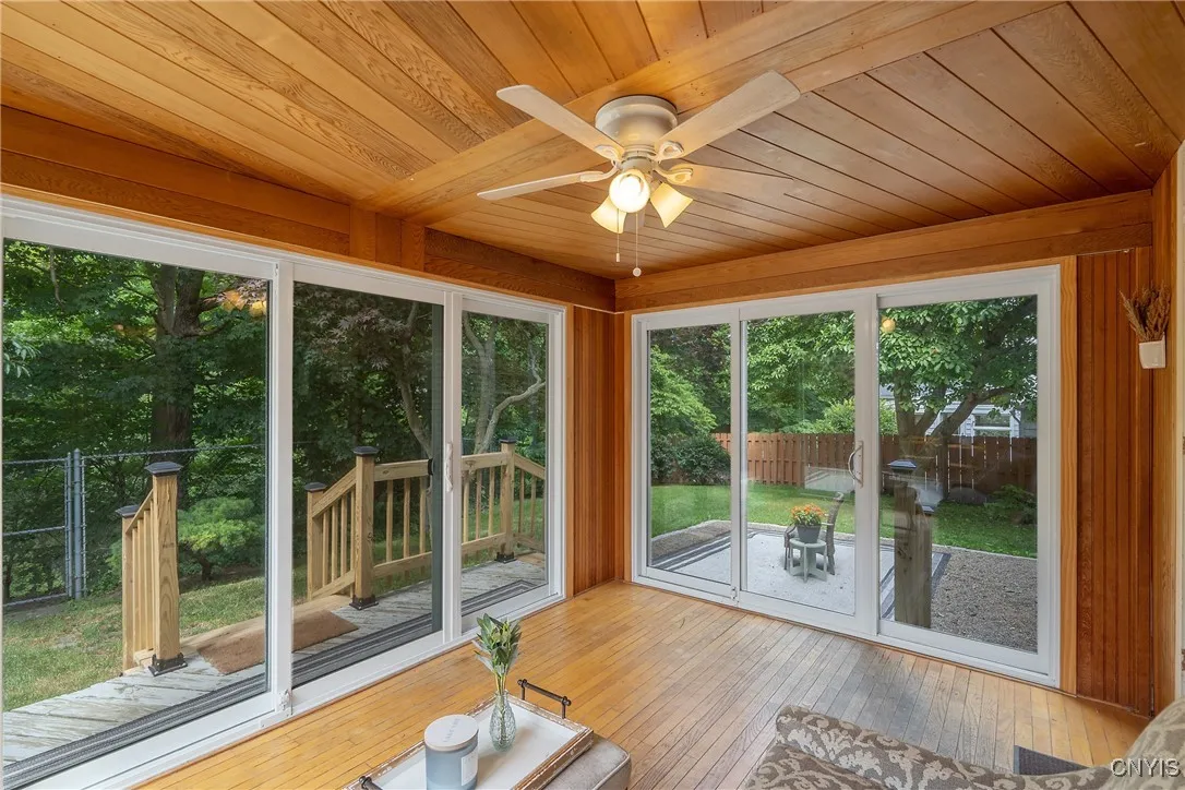 (3) sets of Comfort slider doors installed in 2017 provide a all-encompassing view of the lush foliage and yard to ensure you can unwind in tranquility here morning, noon and night!