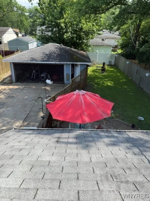 Fenced rear yard and big garage