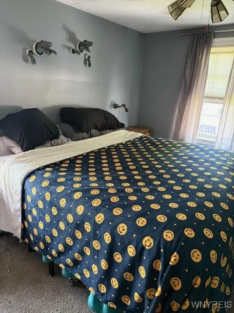 Primary bedroom fits a large bed