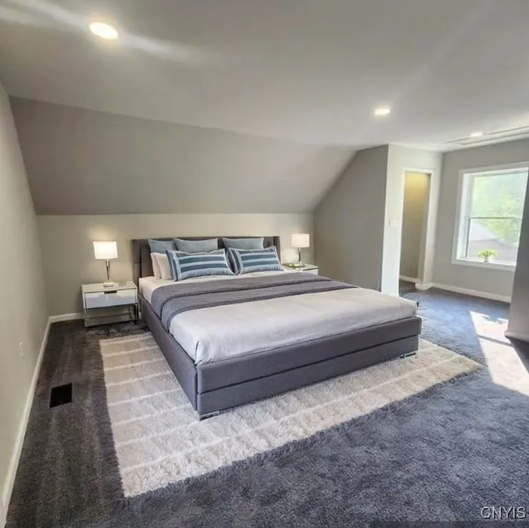 Large Upstairs Bedroom Staged with Attached Bathroom