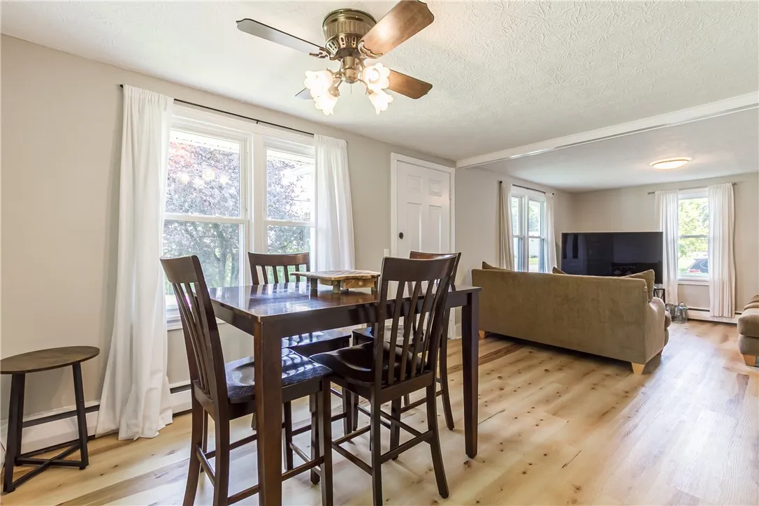 Dining area with great natural light opens to living room