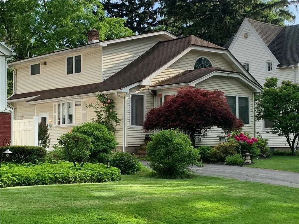 This home has 1840 SF with 2 bedrooms and 1 full bath on the first floor & 1 gorgeous huge bedroom with a skylight and a full bath upstairs any many closets.