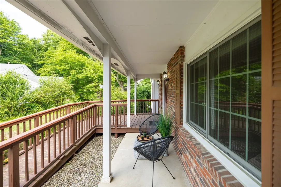Enjoy the open front porch with zero step entry accessibility.