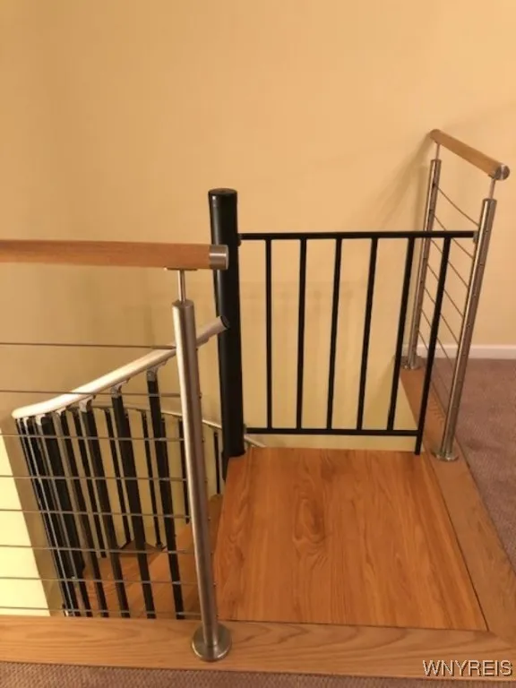 Top of staircase at bedroom.