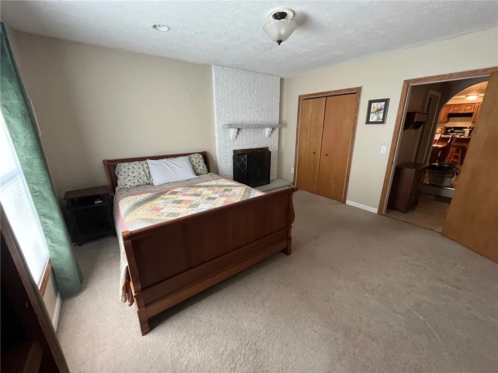 Bedroom 3, den, office, library ~has gas fireplace