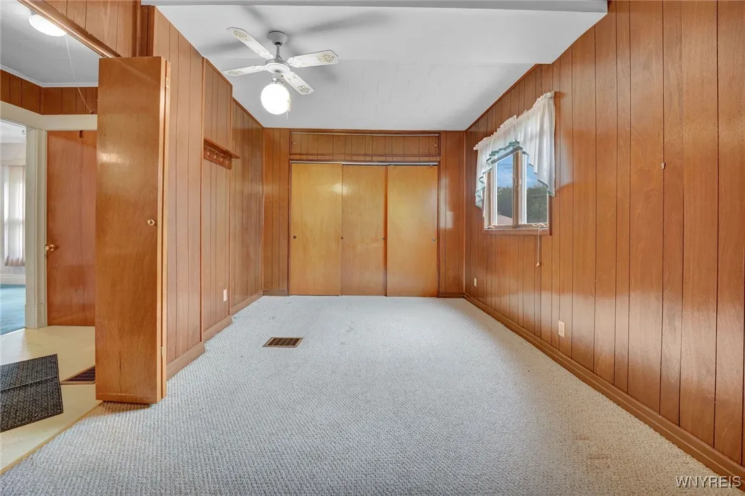 HUGE FIRST FLOOR BEDROOM ADJACENT TO FULL BATH WITH DOUBLE CLOSETS ON BOTH ENDS
