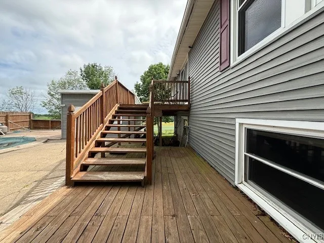 Patio and Deck with access to Sunroom & Dining/Living Room