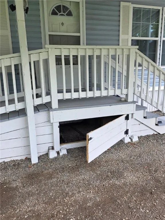 Carport deck access door