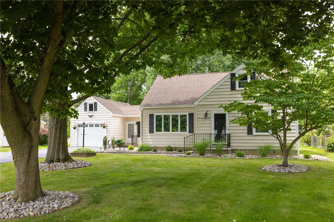 Vinyl siding and rock flower beds for easier maintenance