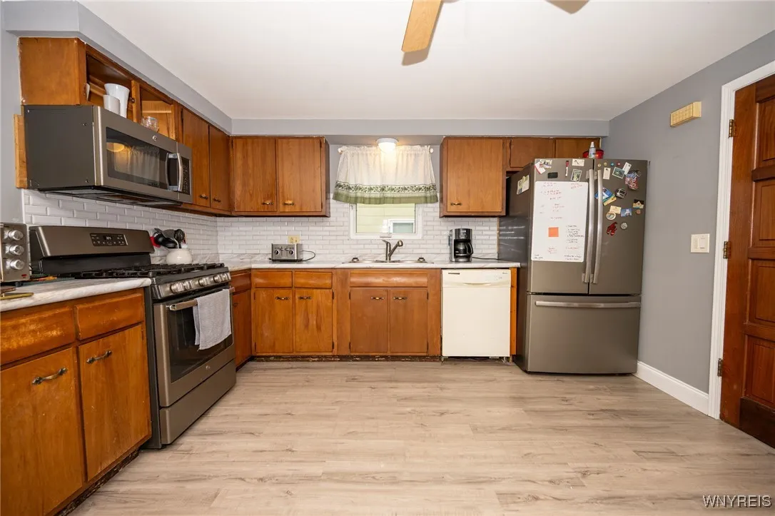 Lower:  Kitchen includes dishwasher and microwave.  Refrigerator and stove/oven NOT included.