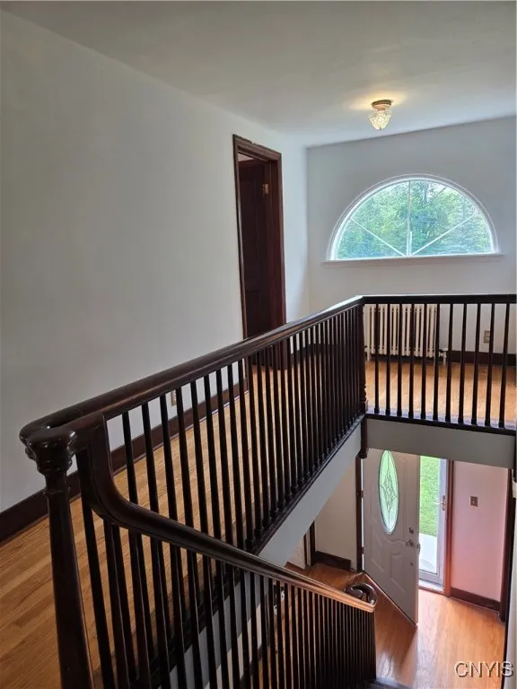So inviting! Open & bright front foyer.