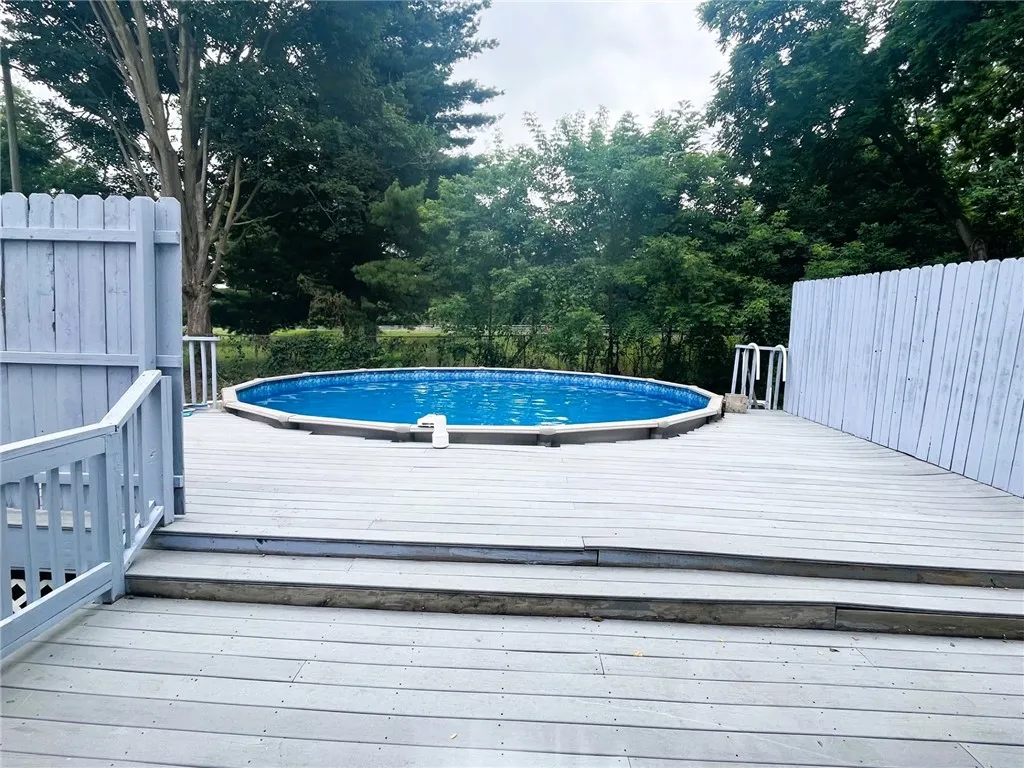 above ground pool with attached deck