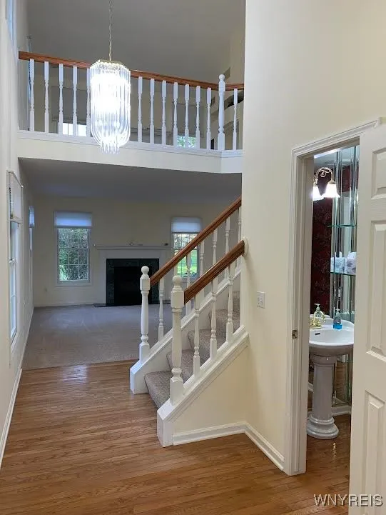 Hallway with half bathroom
