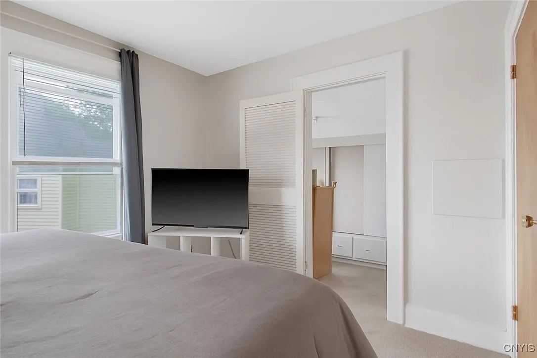 Walk in closet in the primary bedroom

