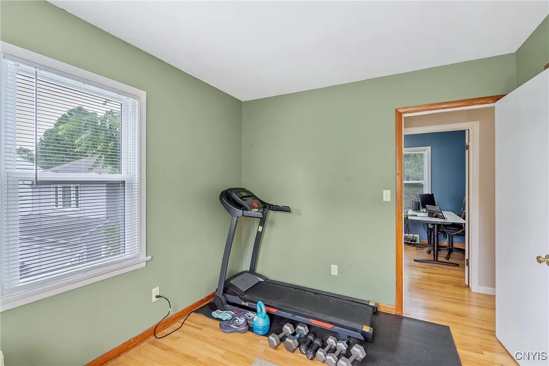 Looking back, the sliding door closet is just behind the hallway door.