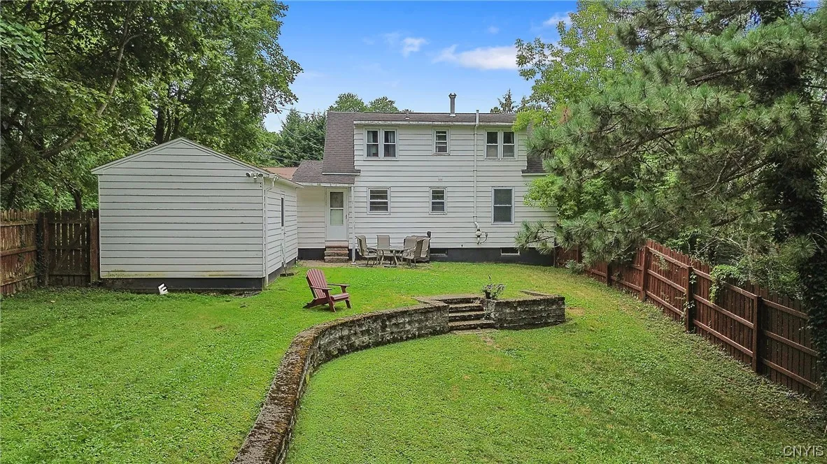 And the yard just keeps on going!  The long retaining wall with steps allows for a flat 2-tiers of lawn (instead of one big hill).  Outdoor entertaining will be a theme with this yard!