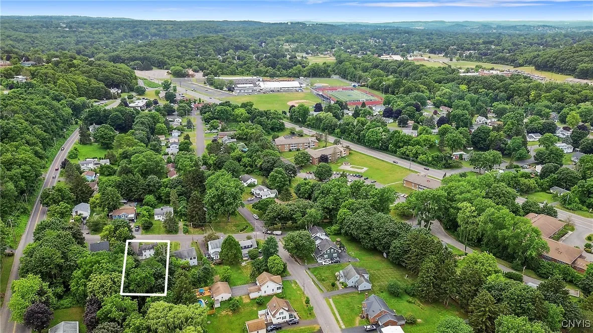 The bird's eye view gives us a glimpse of how peaceful and sweet the neighborhood is, yet oh-so close to shopping, dining, schools and more!