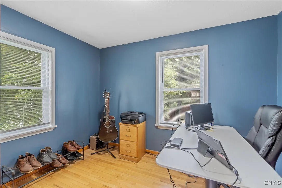Bedroom #2, currently used as a home office is equally big and bright.