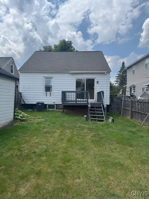 REAR OF HOUSE WITH FULLY FENCED YARD