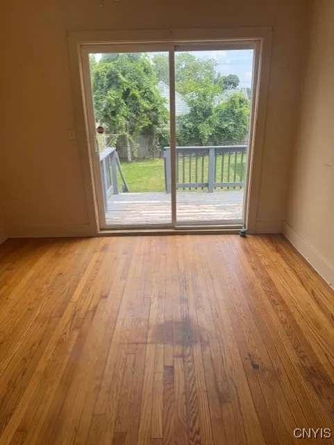 BEDROOM LEADS TO DECK AND BACKYARD