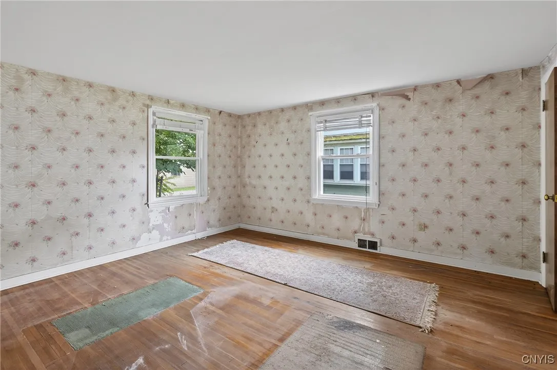 The main bedroom is spacious.  Easily accomodate your furniture here!
