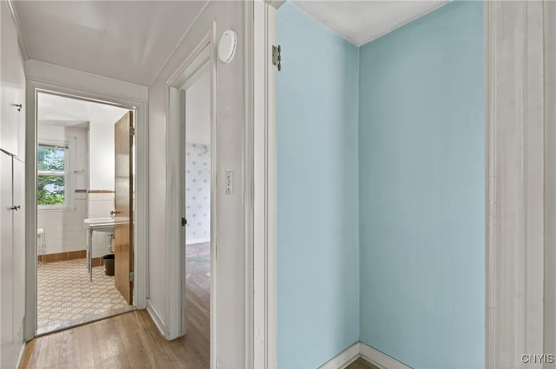 Enjoy adorable built-in cabinetry to the left of the hallway!