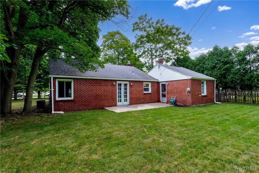 All brick exterior really keeps maintenance down!  Nice patio for grilling or whatever you like!