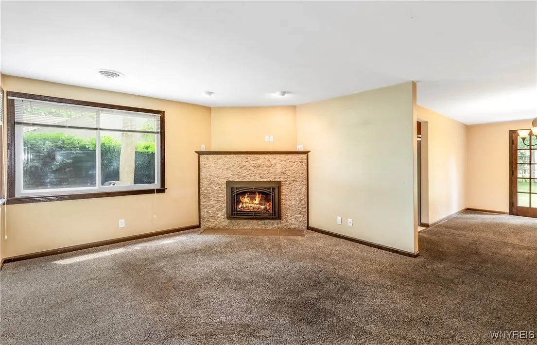 Family room is perfect for TV viewing.  The dining room is on the right side.