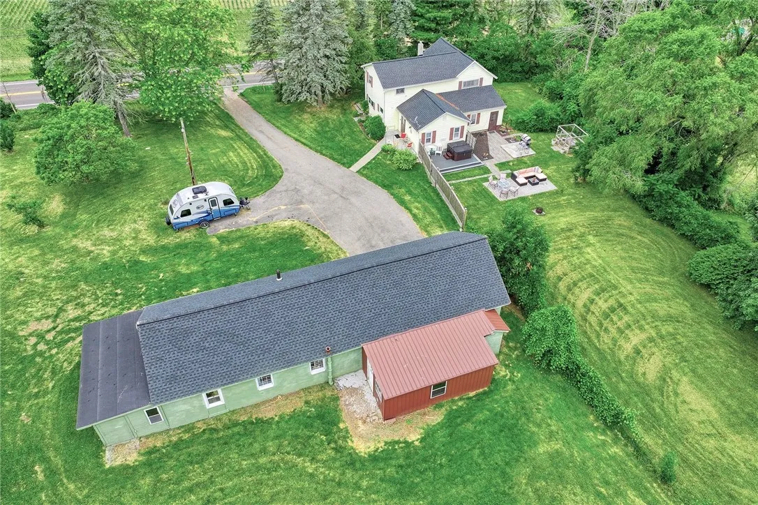 Aerial view of the outbuilding and home.