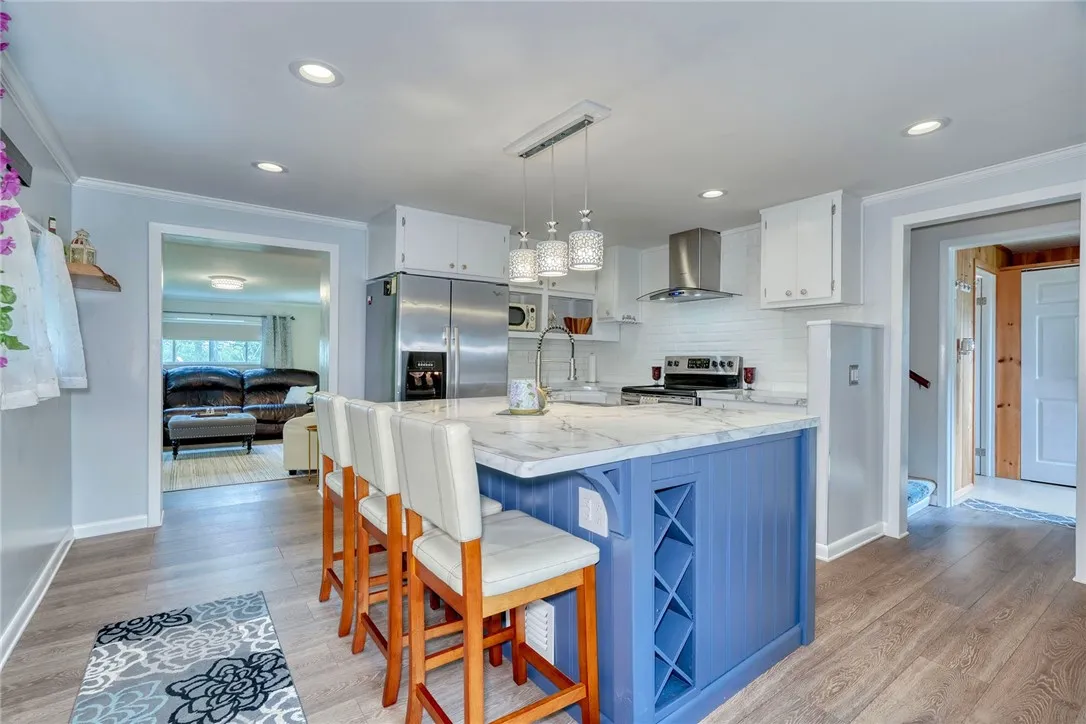 The island offers a wine rack and storage.