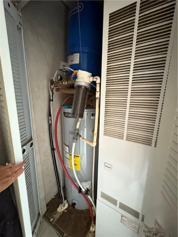 hot water heater/furnace/bladder in laundry room