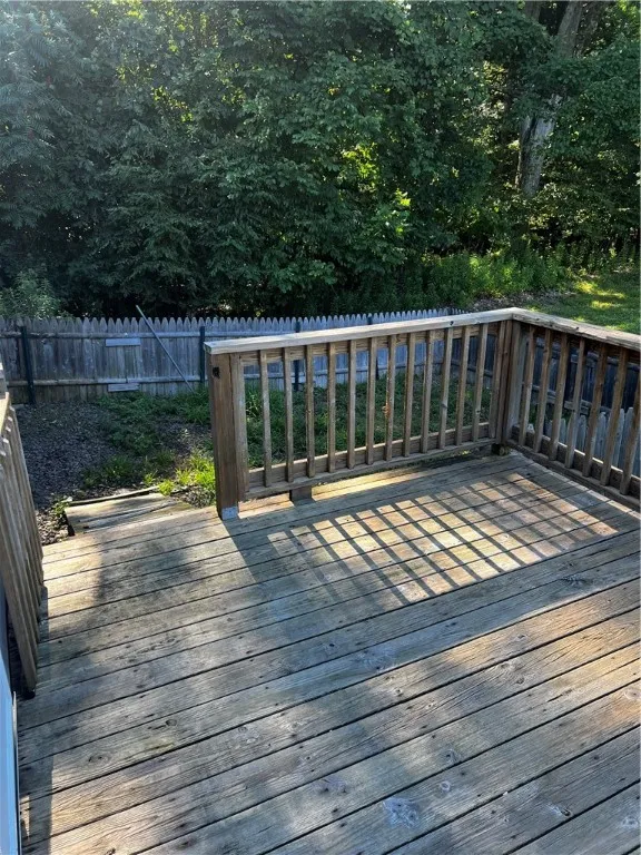 gated front porch to fenced in area for dogs