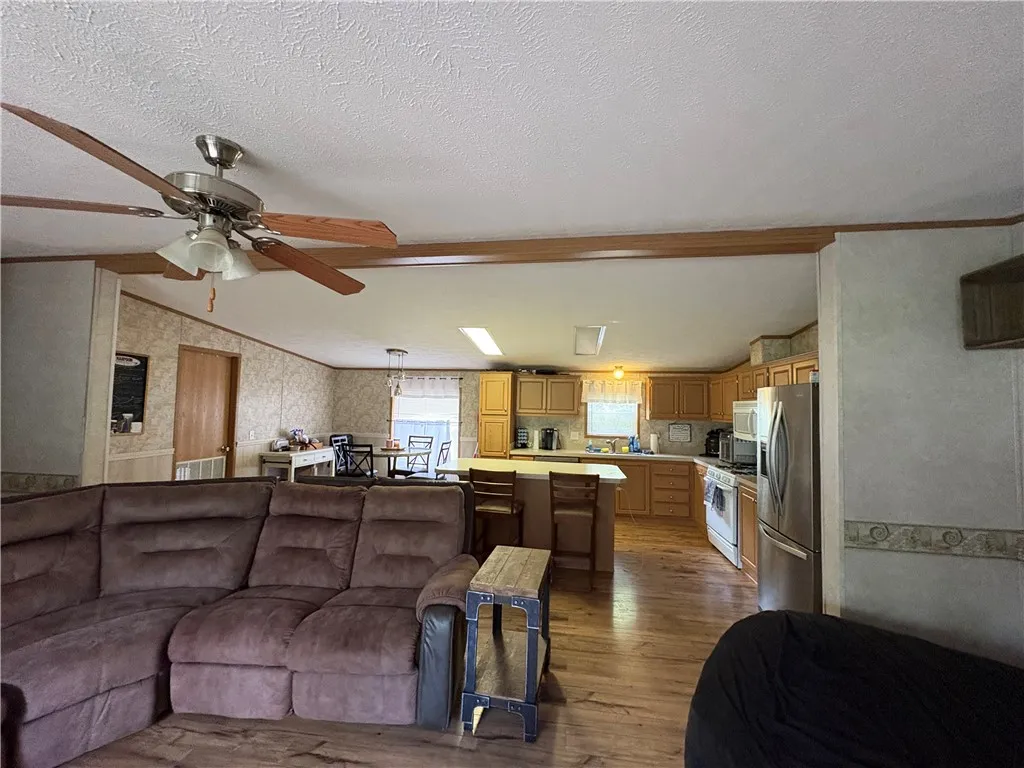 open concept living room/dining room/kitchen