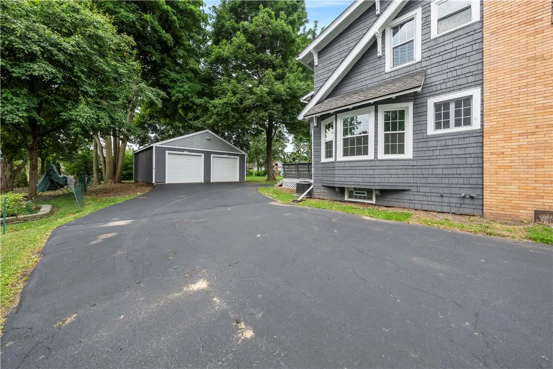 Freshly paved and widened approach to Garage