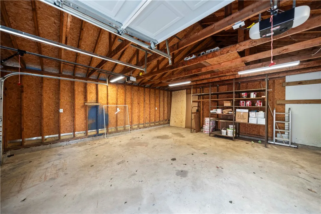 Huge garage fits two cars and still has plenty of room for storage/ workshop. Two new garage doors and openers