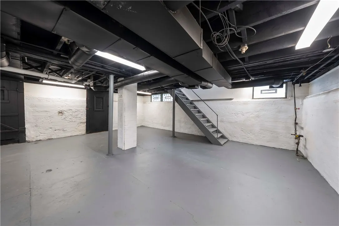 Clean dry basement waiting to be finished or used for storage