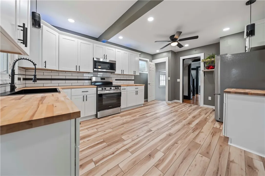Completely remodeled kitchen with vinyl plank flooring