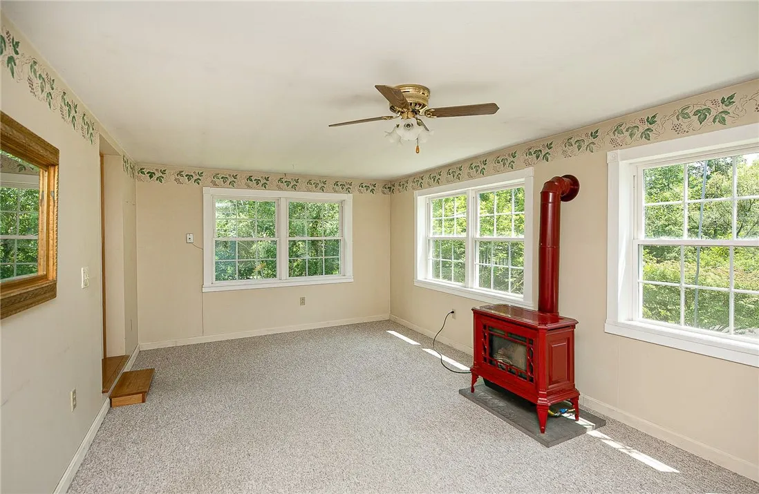 Sun filled hobby room/flex space with outdoor entry
