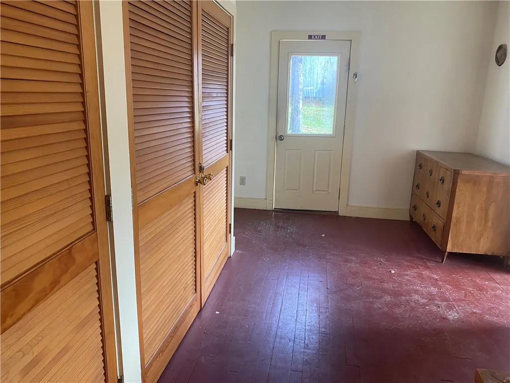 Laundry area with storage and access to side